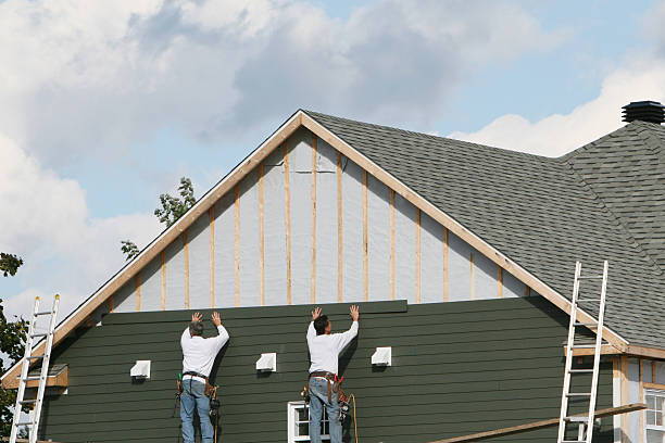 Professional Storm Damage Siding Repair technician working in Cramerton, NC